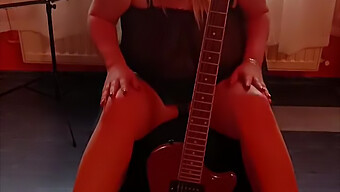 Milf With Big Tits Plays Guitar And Masturbates