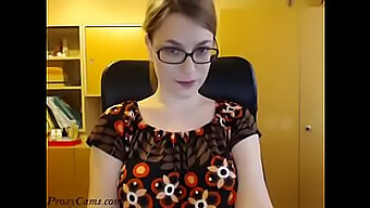 A Sexy Brunette With Glasses Strips And Performs A Striptease On A Webcam - Proxycams.Com