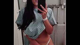 Nearly exposed camgirl indulges in self-pleasure in isolation hospital setting